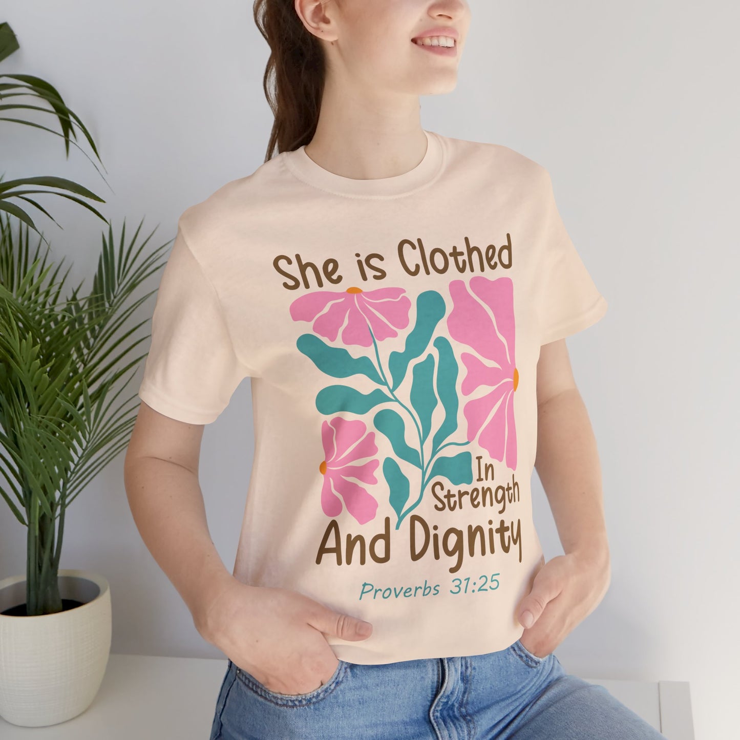 She is Clothed in Strength and Dignity Tee — Proverbs 31:25 Floral Christian T-Shirt